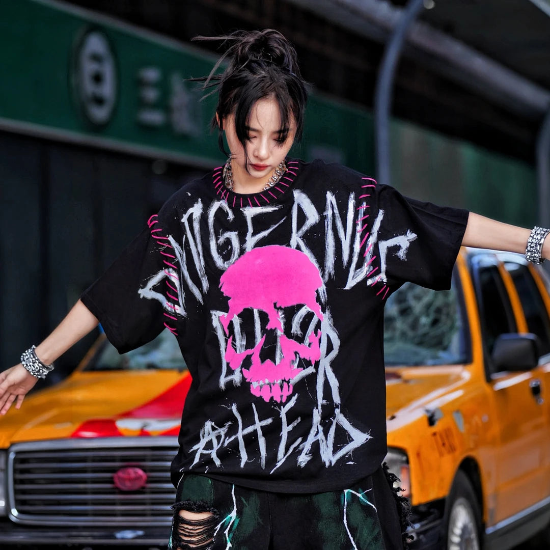 Sanhoostudio short sleeve T-shirt featuring graphic spray-print detailing and a relaxed oversized silhouette. Built for streetwear outfits with breathable comfort, lightweight construction, and versatile everyday styling.