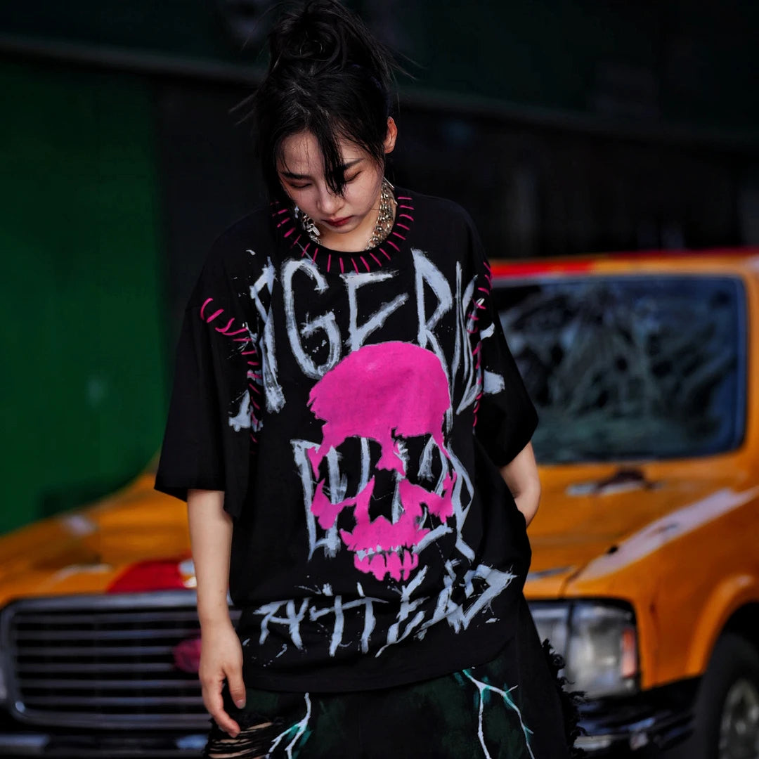 Sanhoostudio short sleeve T-shirt featuring graphic spray-print detailing and a relaxed oversized silhouette. Built for streetwear outfits with breathable comfort, lightweight construction, and versatile everyday styling.