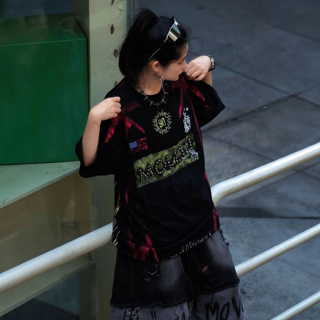 Sanhoostudio short sleeve T-shirt featuring flame-inspired graphics, studded detailing, heavyweight fabric, and a relaxed oversized fit. Designed for vintage streetwear styling with breathable comfort and bold everyday appeal.