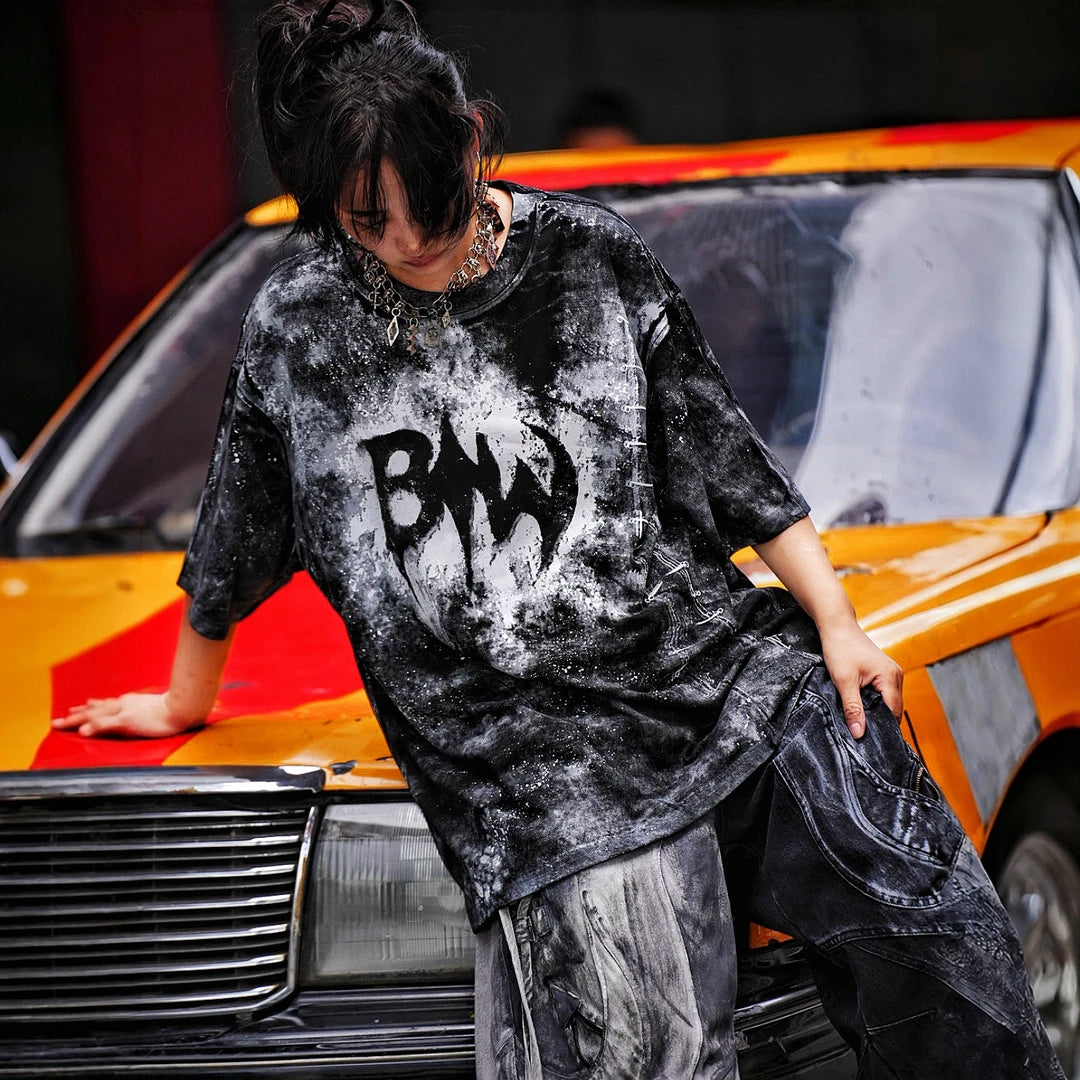 Sanhoostudio short sleeve T-shirt featuring stitch-inspired graphics, hand-painted detailing, and an oversized relaxed fit. Designed for modern streetwear styling with breathable fabric, lightweight comfort, and eye-catching graphic appeal.
