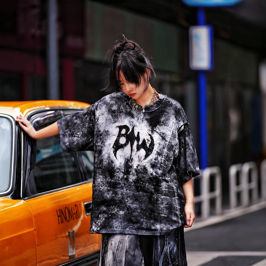 Sanhoostudio short sleeve T-shirt featuring stitch-inspired graphics, hand-painted detailing, and an oversized relaxed fit. Designed for modern streetwear styling with breathable fabric, lightweight comfort, and eye-catching graphic appeal.