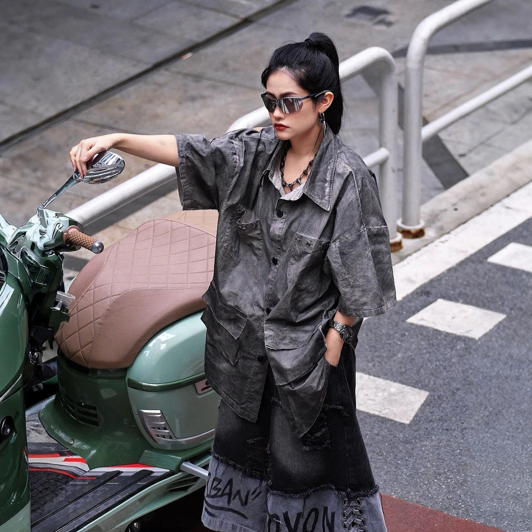 Sanhoostudio short sleeve shirt featuring vintage streetwear styling, a relaxed oversized silhouette, and lightweight breathable fabric. Perfect for casual summer outfits with timeless design and everyday comfort.