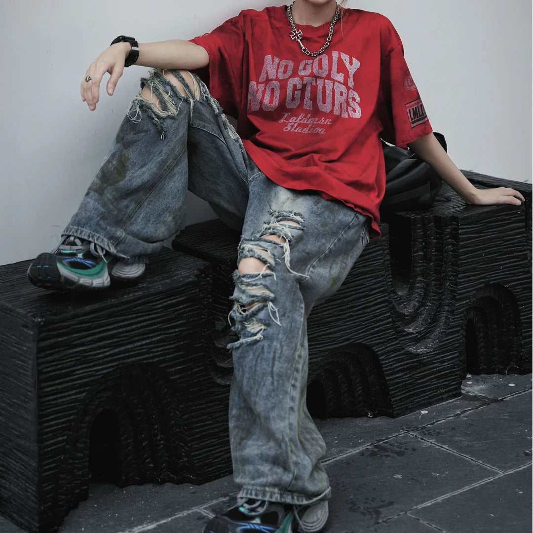 Sanhoostudio straight leg denim pants featuring mud-dye effects, distressed detailing, and a relaxed fit silhouette. Designed for modern streetwear styling with comfortable wear and unique vintage-inspired character.
