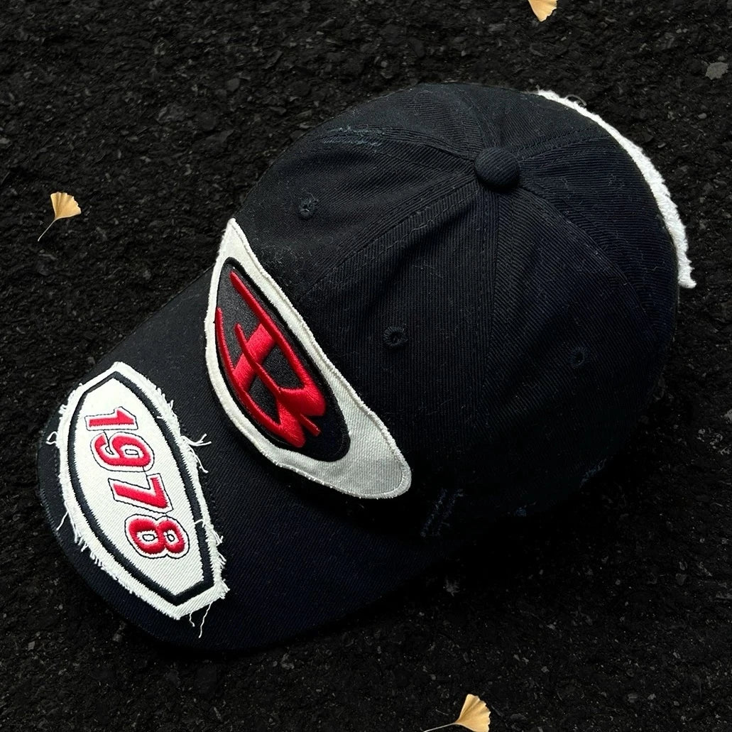 Sanhoostudio baseball cap featuring premium embroidered detailing, a classic curved brim, and an adjustable fit. Designed for everyday streetwear styling with comfortable wear and timeless vintage appeal.