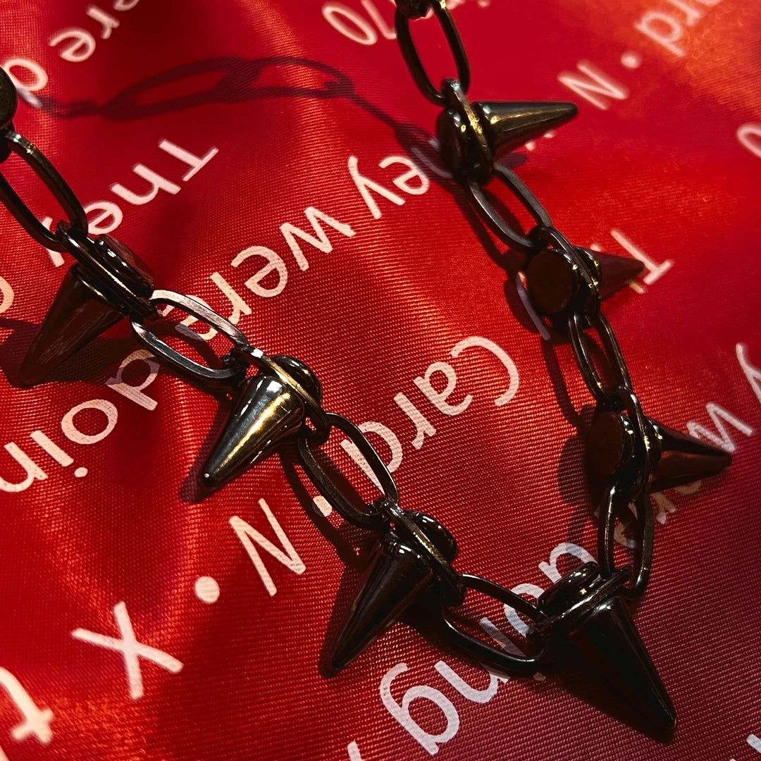 Sanhoostudio titanium steel necklace featuring a minimalist chain design with durable construction and versatile styling. Perfect for everyday layering with streetwear, casual, and modern fashion outfits.