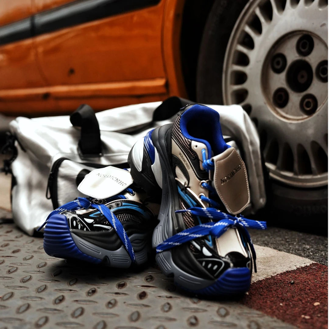 Sanhoostudio dad sneakers featuring a Klein blue colorway, deconstructed lace-up design, and cushioned sole construction. Built for all-day comfort with versatile streetwear styling and a bold contemporary aesthetic.