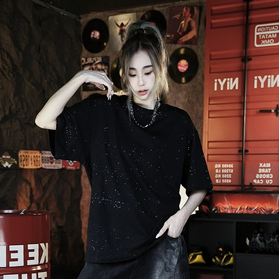 Sanhoostudio short sleeve T-shirt featuring an all-over star-inspired graphic design and a relaxed oversized silhouette. Designed for summer streetwear styling with comfortable everyday wear, bold visual appeal, and versatile pairing with denim or cargo pants.