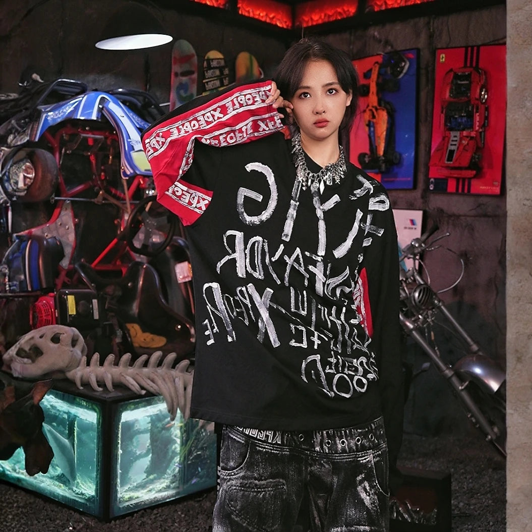 Sanhoostudio short sleeve T-shirt featuring hand-painted artwork, contrast patchwork detailing, and a relaxed oversized silhouette. Designed for bold high-street styling with expressive visual texture, breathable everyday comfort, and a distinctive hip-hop inspired streetwear aesthetic.