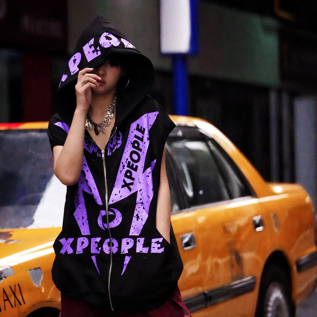 Sanhoostudio vest featuring purple graphic detailing, an open-front design, and a relaxed oversized silhouette. Designed for bold streetwear layering with comfortable movement, versatile styling, and a distinctive urban aesthetic inspired by contemporary hip-hop fashion.
