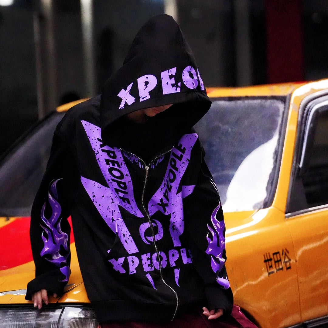 Sanhoostudio vest featuring purple graphic detailing, an open-front design, and a relaxed oversized silhouette. Designed for bold streetwear layering with comfortable movement, versatile styling, and a distinctive urban aesthetic inspired by contemporary hip-hop fashion.