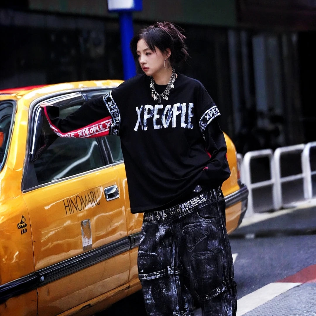 Sanhoostudio short sleeve T-shirt featuring hand-painted graphic artwork, contrast patchwork detailing, and a relaxed oversized silhouette. Designed for expressive streetwear styling with breathable everyday comfort, bold visual texture, and versatile urban appeal.