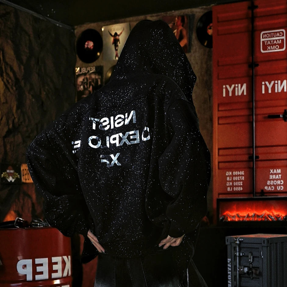 Sanhoostudio zip hoodie featuring liquid-metal inspired detailing, all-over star embellishments, and a statement textured finish. Designed for bold fall streetwear layering with comfortable everyday wear, distinctive visual depth, and a futuristic urban aesthetic.