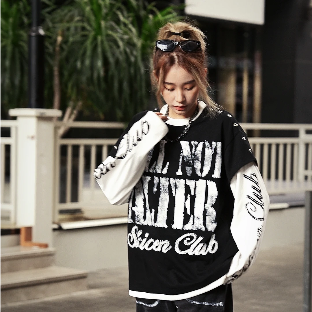 Sanhoostudio long sleeve T-shirt featuring graffiti letter graphics, a layered two-piece effect, and a relaxed oversized silhouette. Designed for American-inspired streetwear styling with comfortable fall wear, bold graphic character, and effortless everyday versatility.