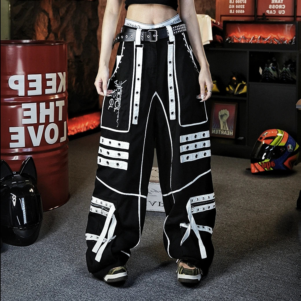 Sanhoostudio denim pants featuring distinctive tie-dye treatment, metal detailing, hanging strap accents, and a relaxed straight-leg silhouette. Designed with punk-inspired streetwear character for statement styling, comfortable movement, and bold contemporary urban outfits.