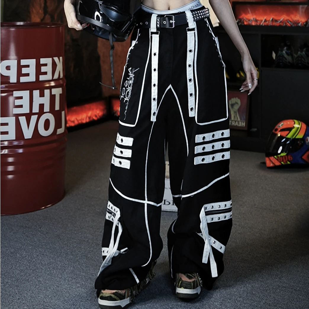 Sanhoostudio denim pants featuring distinctive tie-dye treatment, metal detailing, hanging strap accents, and a relaxed straight-leg silhouette. Designed with punk-inspired streetwear character for statement styling, comfortable movement, and bold contemporary urban outfits.