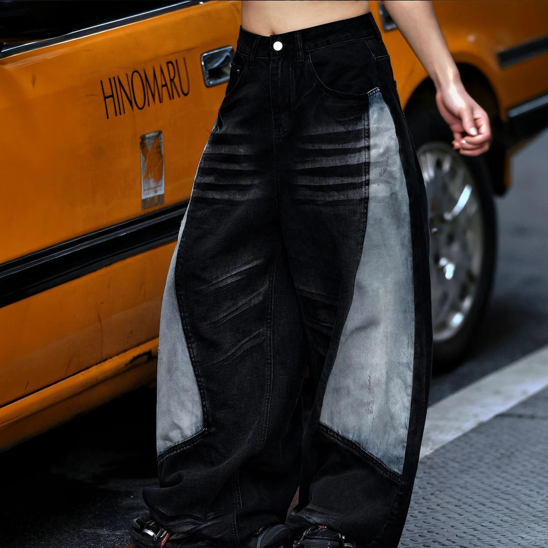 Sanhoostudio denim pants featuring heavy washed treatment, contrast patchwork construction, and a relaxed wide leg floor-length silhouette. Designed for vintage-inspired streetwear styling with rugged denim texture, oversized proportions, comfortable movement, and bold urban character.