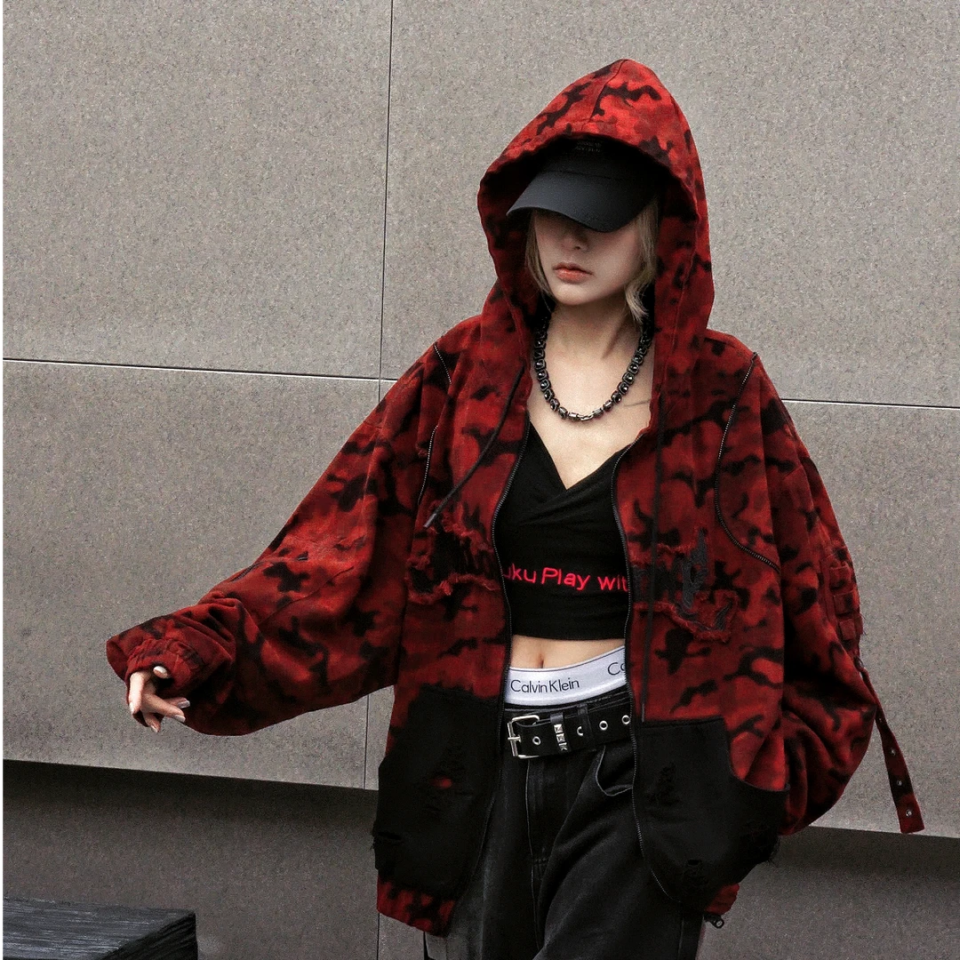 Sanhoostudio denim jacket featuring red camouflage graphics, distressed wash treatment, and a relaxed oversized silhouette. Designed for fall and winter streetwear layering with rugged vintage texture, bold visual character, and comfortable everyday styling.