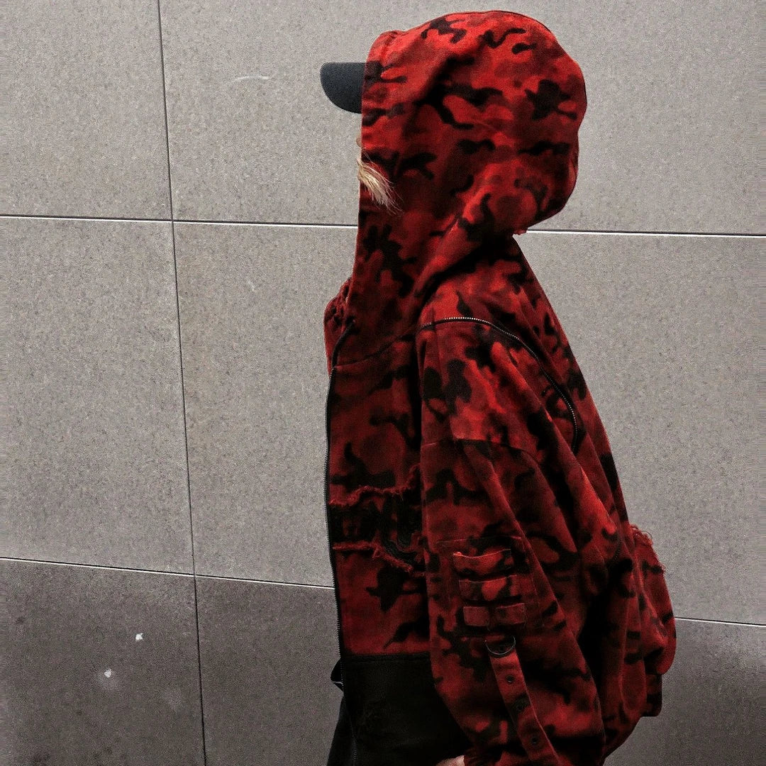 Sanhoostudio denim jacket featuring red camouflage graphics, distressed wash treatment, and a relaxed oversized silhouette. Designed for fall and winter streetwear layering with rugged vintage texture, bold visual character, and comfortable everyday styling.