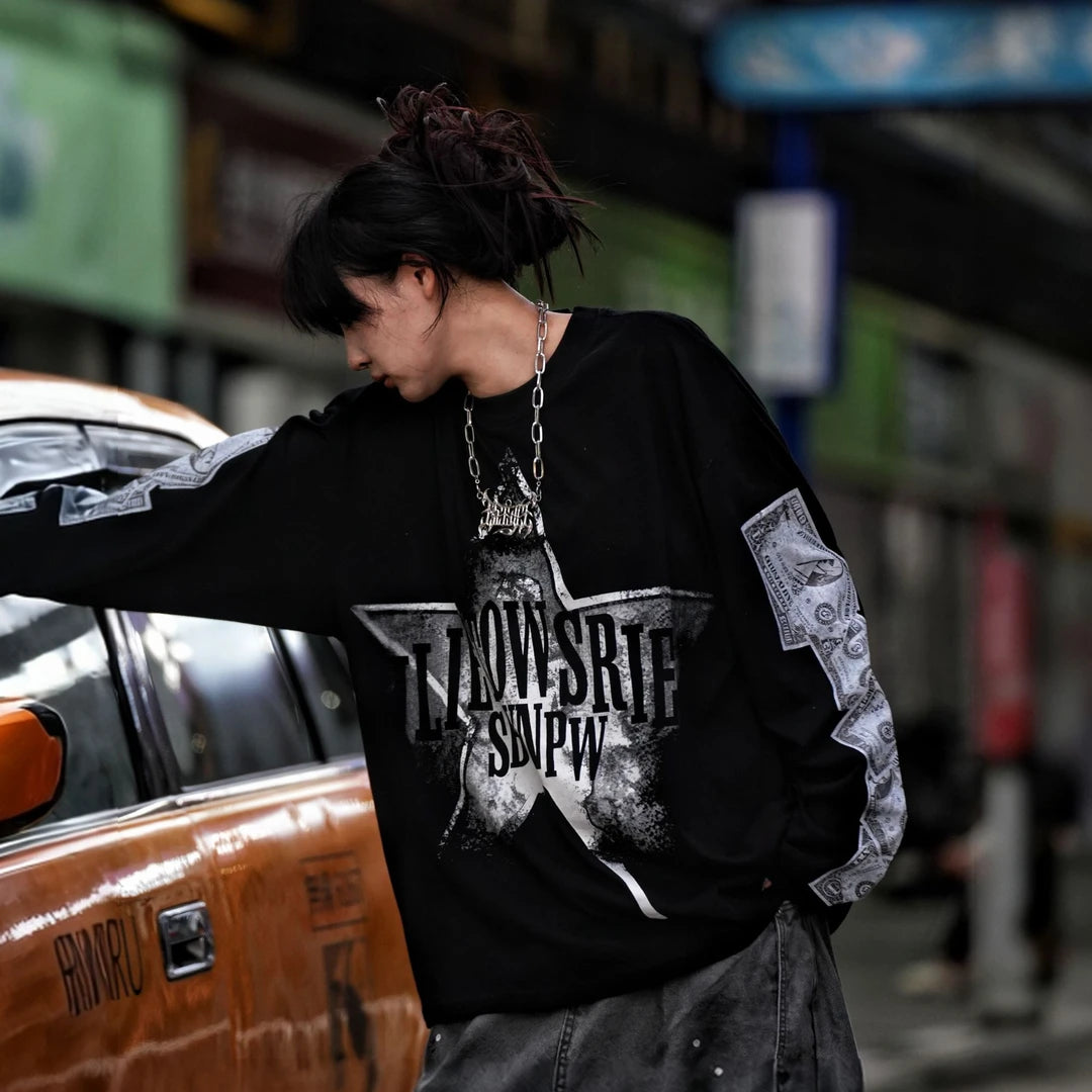 Sanhoostudio long sleeve T-shirt featuring dollar-inspired digital graphics, lightweight fabric construction, and a relaxed oversized silhouette. Designed for effortless layering and streetwear styling with breathable comfort, bold visual character, and versatile everyday wear.
