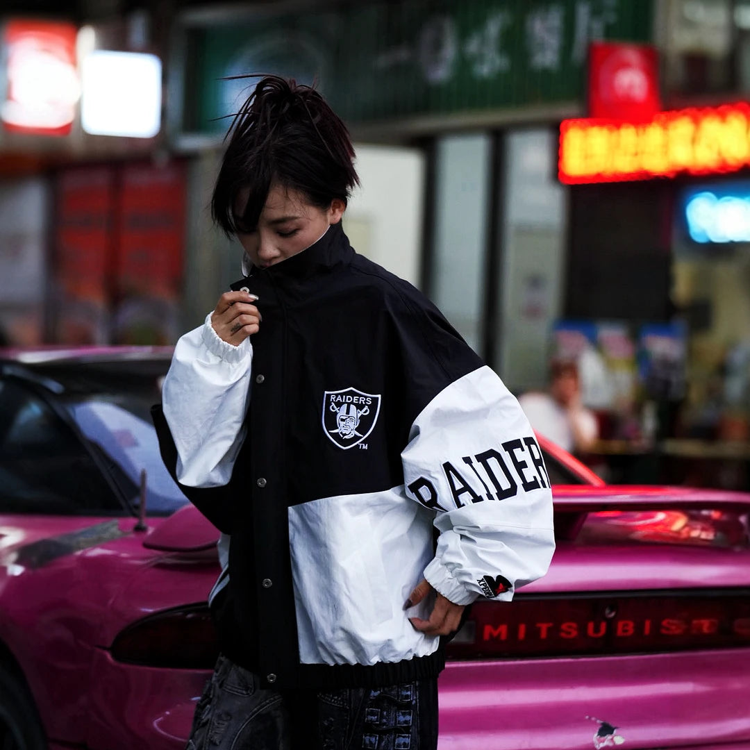 Sanhoostudio long sleeve cardigan featuring statement shield-inspired graphic artwork, an open-front construction, and a relaxed oversized silhouette. Designed for bold streetwear layering with comfortable movement, distinctive visual character, and effortless high-street styling.