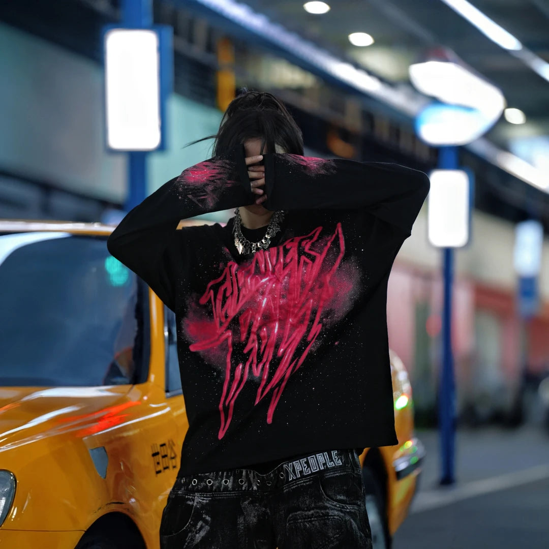 Sanhoostudio long sleeve T-shirt featuring red galaxy-inspired digital graphics, lightweight fabric construction, and a relaxed oversized silhouette. Designed for effortless layering with bold visual impact, breathable everyday comfort, and versatile streetwear styling.