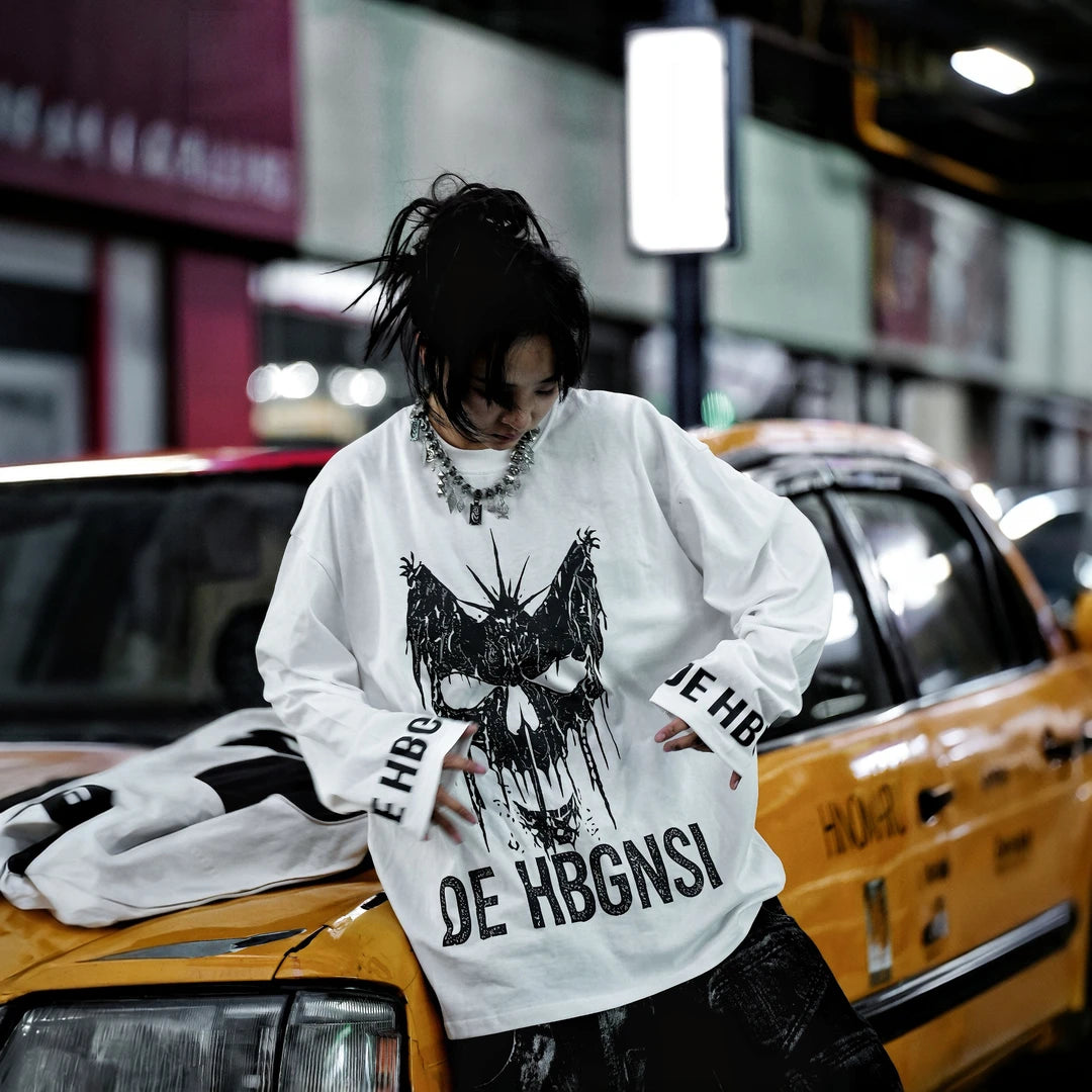 Sanhoostudio long sleeve T-shirt featuring statement digital print graphics, lightweight construction, and a relaxed oversized silhouette. Designed for dark streetwear styling and effortless layering with breathable comfort, bold visual character, and versatile everyday wear.