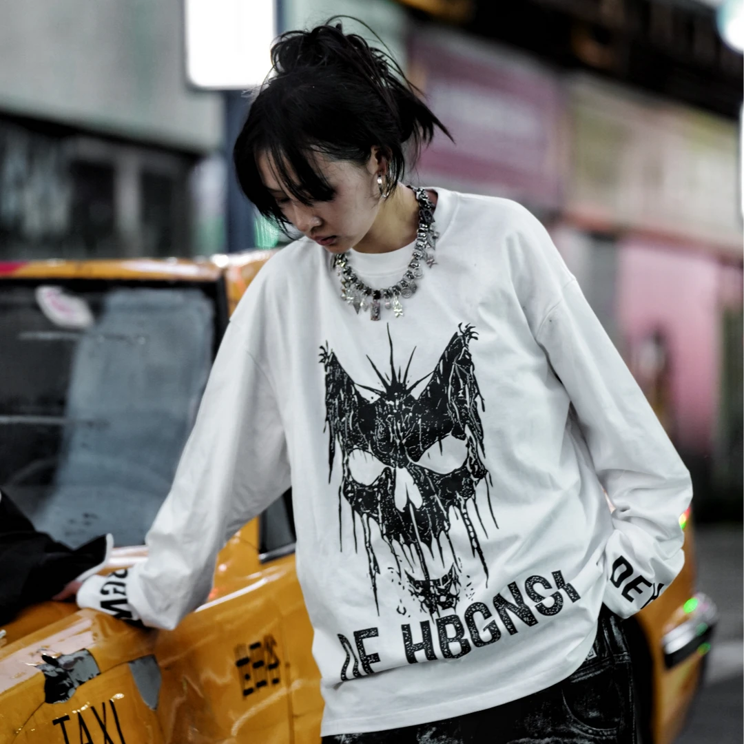 Sanhoostudio long sleeve T-shirt featuring statement digital print graphics, lightweight construction, and a relaxed oversized silhouette. Designed for dark streetwear styling and effortless layering with breathable comfort, bold visual character, and versatile everyday wear.