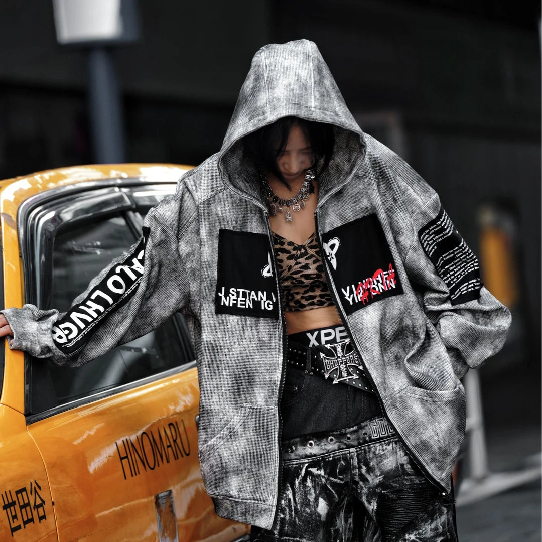 Sanhoostudio zip hoodie featuring a meteor grey colorway, statement graphic artwork, and a relaxed wide oversized silhouette. Designed for contemporary streetwear layering with comfortable everyday wear, bold visual character, and versatile urban styling.