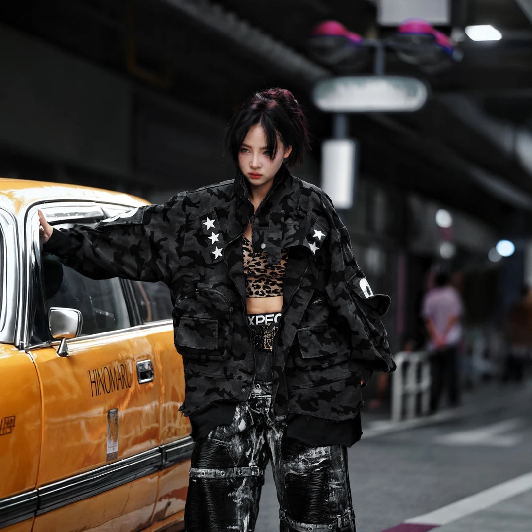 Sanhoostudio denim jacket featuring digital print artwork, distressed detailing, patchwork construction, and a relaxed oversized silhouette. Designed for statement streetwear layering with bold graphic texture, rugged denim character, comfortable wear, and versatile contemporary urban styling.