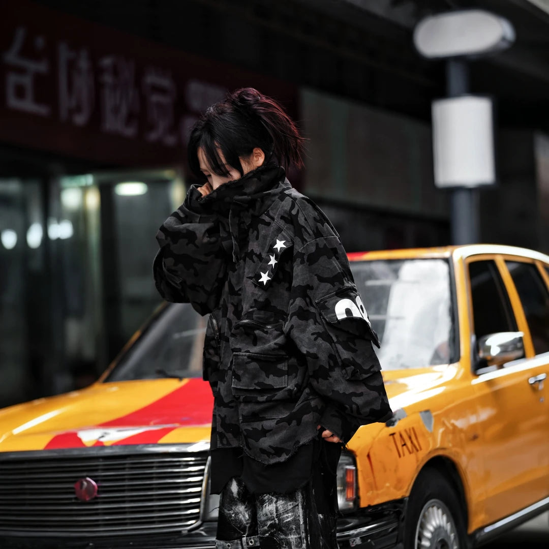 Sanhoostudio denim jacket featuring digital print artwork, distressed detailing, patchwork construction, and a relaxed oversized silhouette. Designed for statement streetwear layering with bold graphic texture, rugged denim character, comfortable wear, and versatile contemporary urban styling.