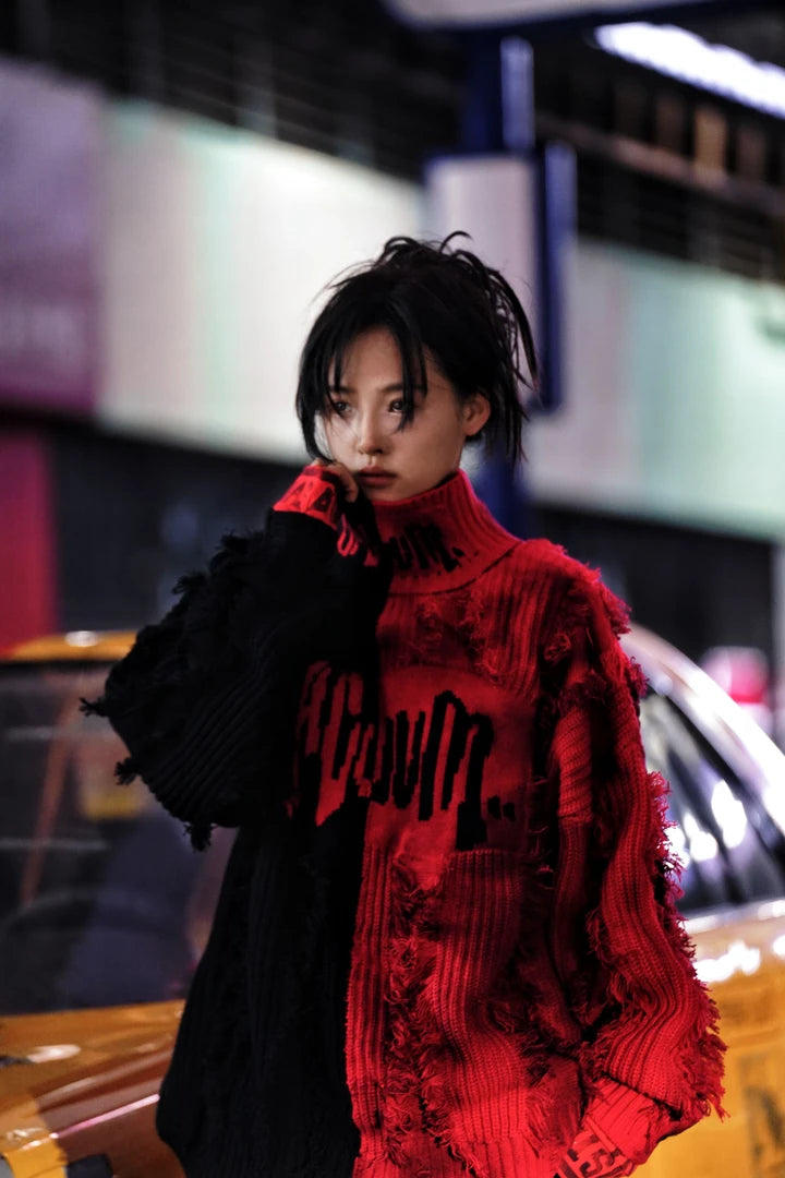 Sanhoostudio knit sweater featuring a bold black and red colorway, heavyweight woven construction, distressed graffiti artwork, hand-painted detailing, and asymmetric patchwork elements. Designed with a relaxed oversized silhouette for statement streetwear styling and distinctive deconstructed appeal.