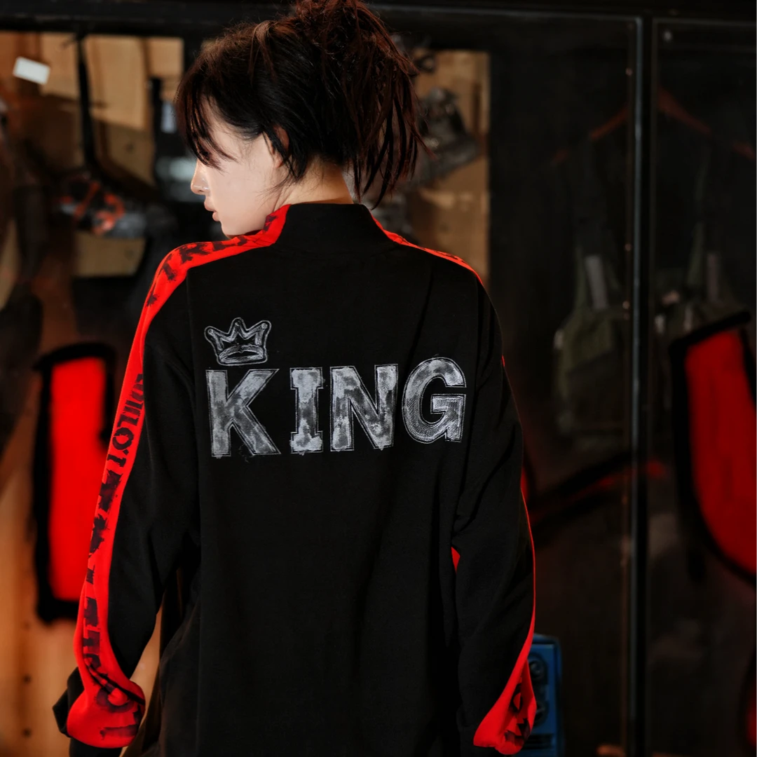 Sanhoostudio thermal long sleeve T-shirt featuring graffiti-inspired scan graphics, soft thermal fabric, asymmetric detailing, and a relaxed oversized silhouette. Designed for contemporary streetwear layering with comfortable warmth, distinctive digital artwork, and versatile everyday styling.