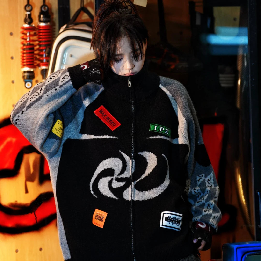 Sanhoostudio knit sweater featuring heavyweight knitted construction, hand-painted graphic detailing, asymmetric patchwork elements, and a relaxed oversized silhouette. Designed for statement streetwear styling with distinctive artistic textures, comfortable warmth, deconstructed aesthetics, and versatile layering.