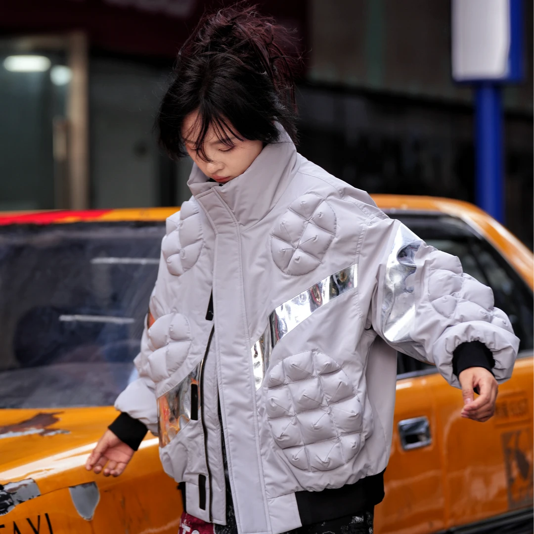 Sanhoostudio cropped down jacket featuring 90% down filling, handcrafted distressed detailing, stain-effect washed textures, and a structured stand collar. Designed for winter streetwear styling with lightweight insulation, comfortable warmth, relaxed proportions, and a bold contemporary silhouette.