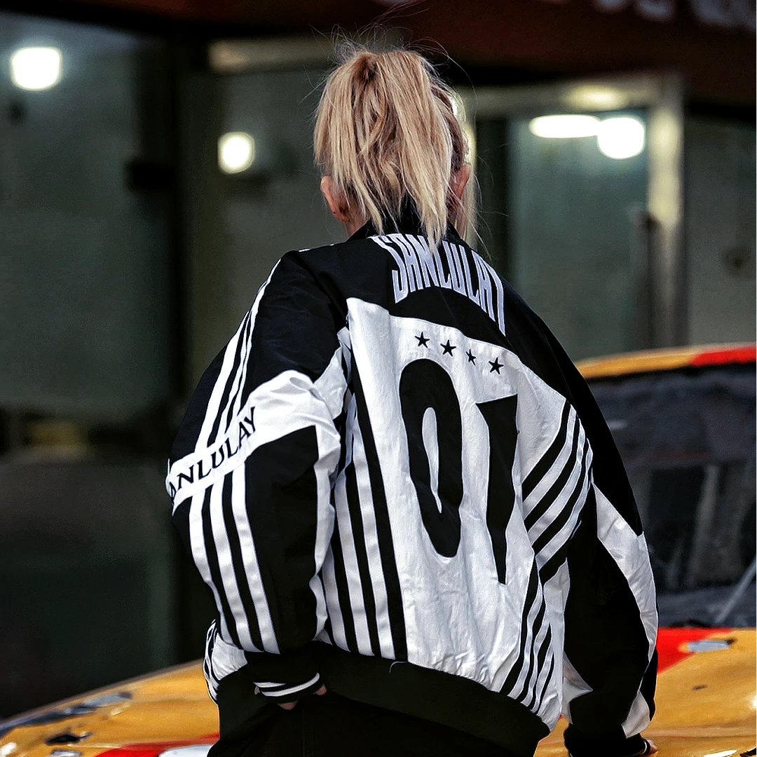 Sanhoostudio padded jacket featuring bold colorblock panels, patchwork construction, and a relaxed oversized silhouette. Designed for fall and winter streetwear styling with comfortable insulation, distinctive contrasting colors, versatile layering, and a modern unisex aesthetic.