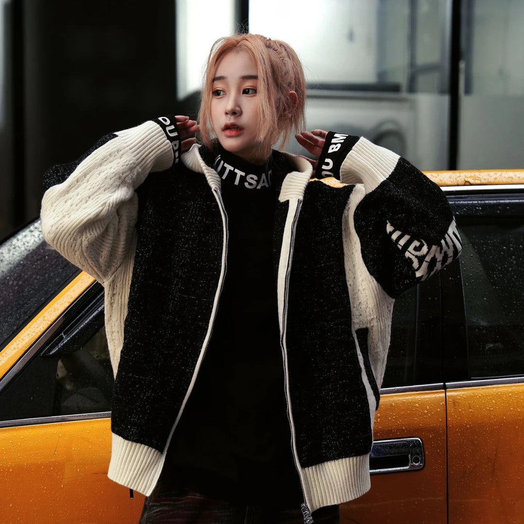 Sanhoostudio hooded knit cardigan featuring all-over star embellishments, contrasting colorblock panels, and a relaxed oversized silhouette. Designed for statement streetwear layering with comfortable knitted texture, distinctive visual detailing, versatile styling, and contemporary unisex appeal.