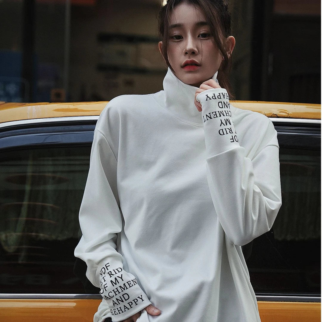Sanhoostudio thermal long sleeve T-shirt featuring a protective high neckline, soft fleece fabric, and a relaxed oversized silhouette. Designed for comfortable fall and winter layering with gentle warmth, flexible everyday wear, versatile styling, and modern unisex streetwear appeal.