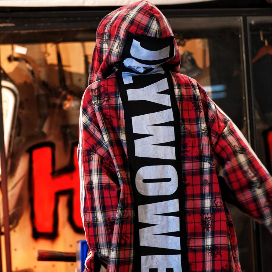 Sanhoostudio fleece-lined jacket featuring red plaid-inspired graphic detailing, digital print artwork, patchwork construction, and a relaxed oversized silhouette. Designed for fall and winter streetwear styling with comfortable warmth, distinctive contrasting textures, versatile layering, and bold contemporary appeal.
