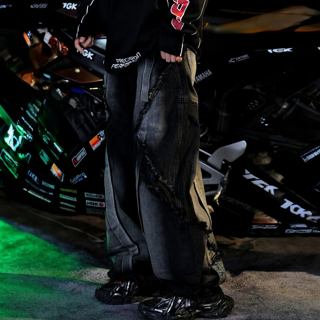 Sanhoostudio denim pants featuring heavyweight black denim, vintage washed treatment, and an oversized wide leg silhouette with an extended floor-length cut. Designed for contemporary American streetwear styling with rugged denim texture, relaxed proportions, comfortable everyday wear, and effortless urban appeal.