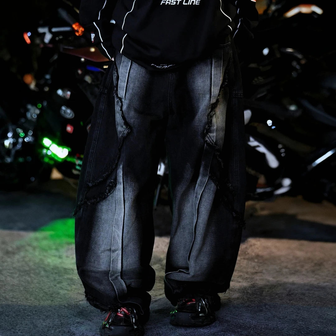 Sanhoostudio denim pants featuring heavyweight black denim, vintage washed treatment, and an oversized wide leg silhouette with an extended floor-length cut. Designed for contemporary American streetwear styling with rugged denim texture, relaxed proportions, comfortable everyday wear, and effortless urban appeal.