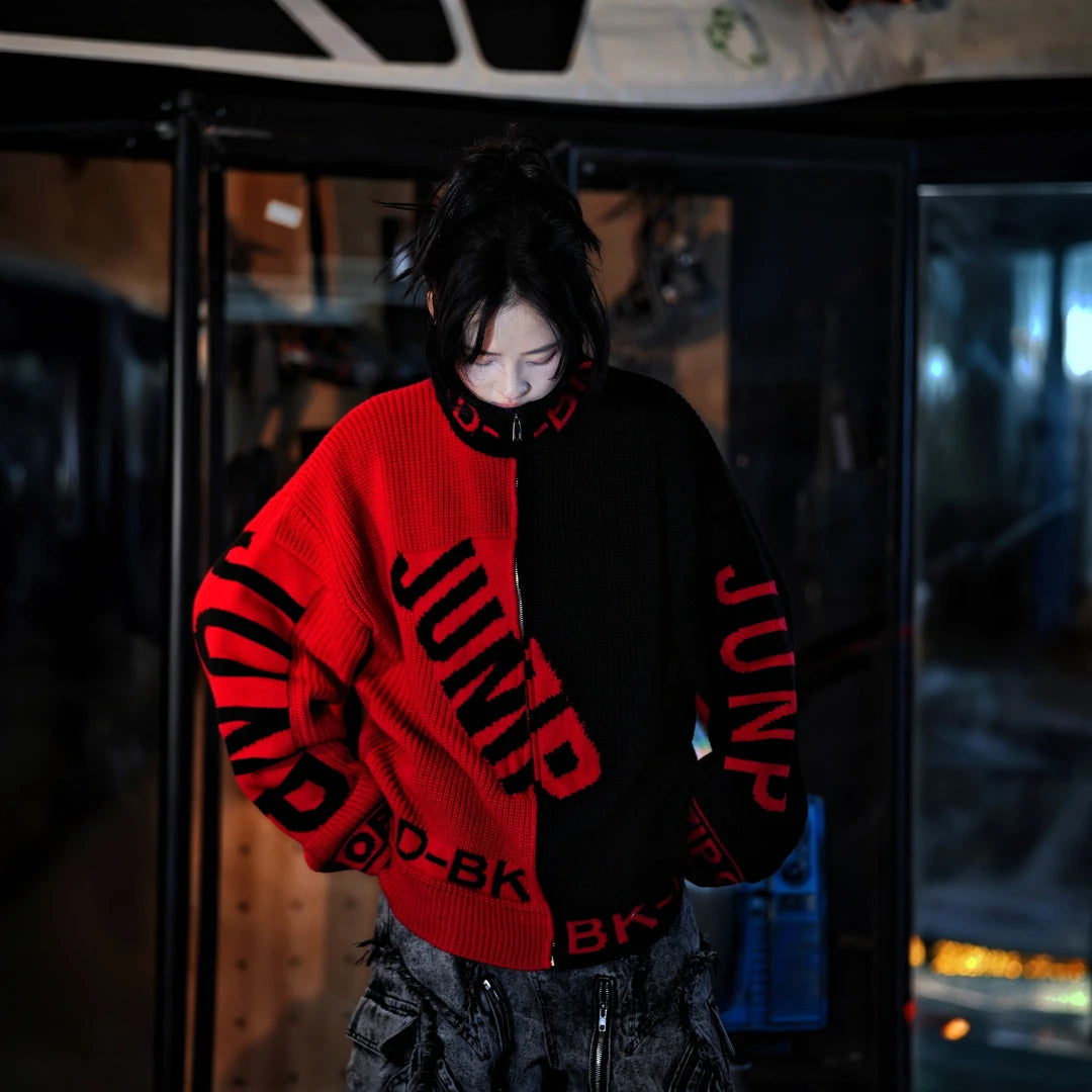 Sanhoostudio knit sweater featuring a contrasting black and red colorway, heavyweight knitted construction, subtitle-inspired graphic details, distressed graffiti artwork, and hand-painted patchwork elements. Designed with a relaxed oversized silhouette for statement streetwear styling, comfortable warmth, and appeal.