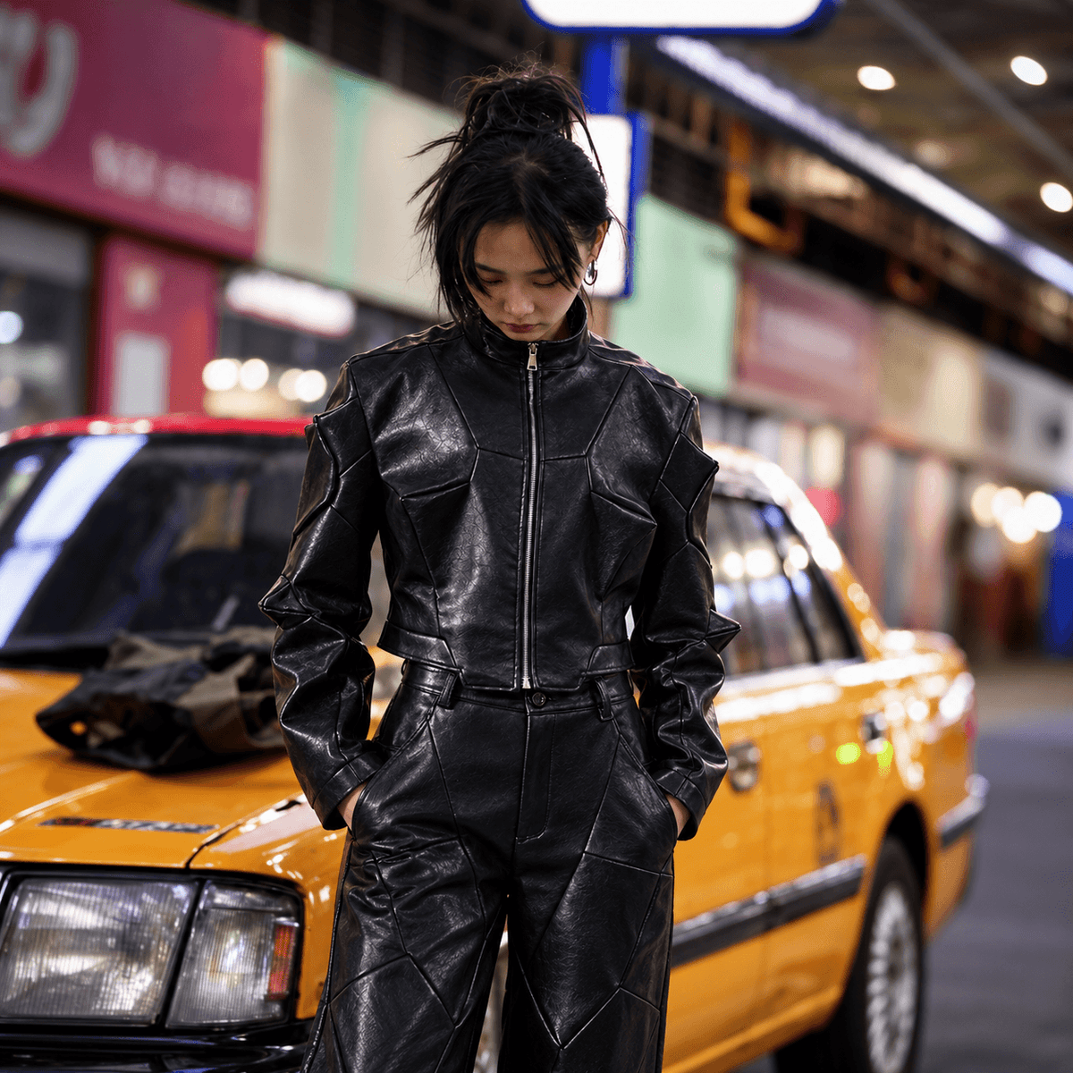 Sanhoostudio PU leather jacket featuring deconstructed panel construction, asymmetric back cutting, and an unconventional sculptural silhouette. Designed for statement streetwear styling with experimental structure, motorcycle-inspired character, and bold contemporary urban appeal.