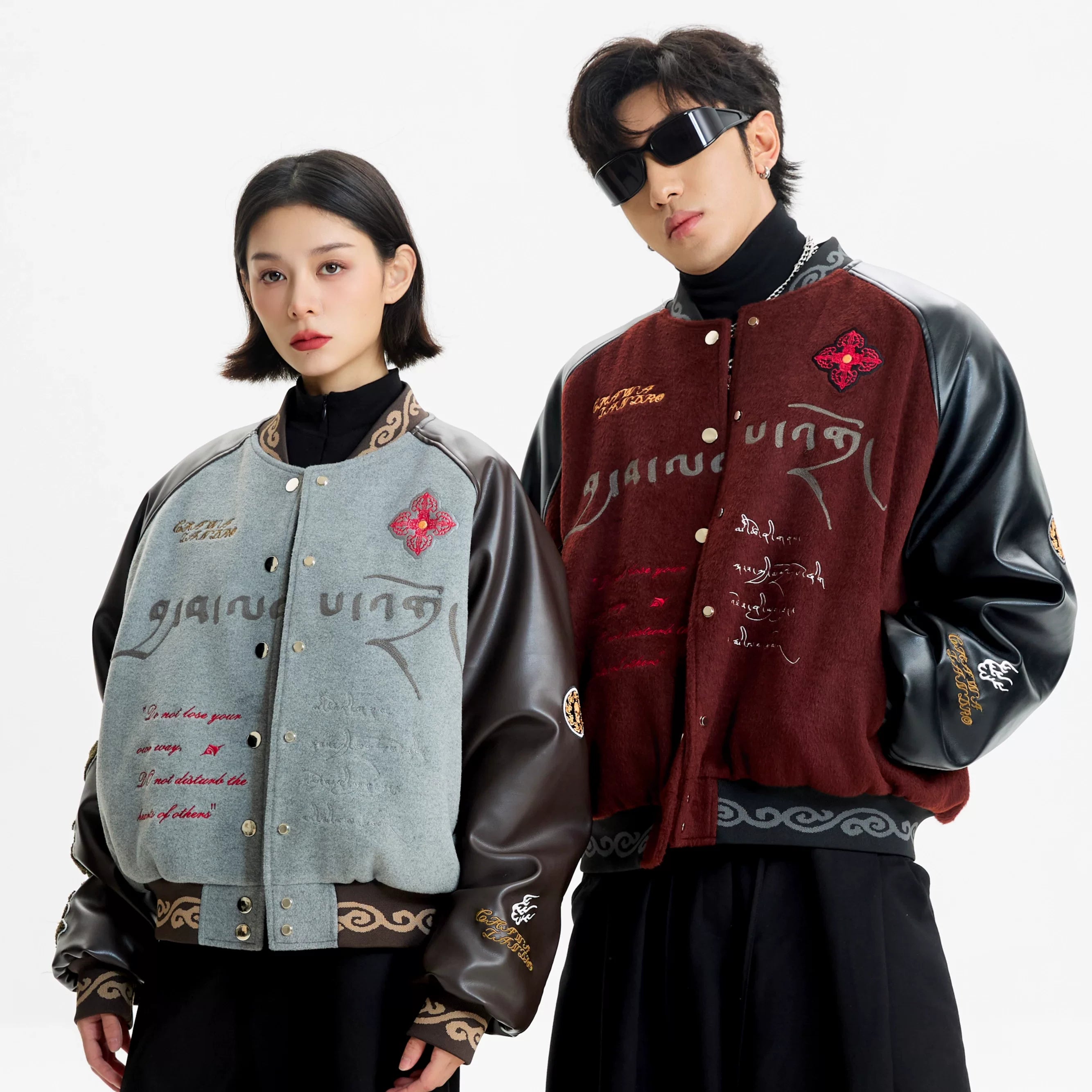 Sanhoostudio padded varsity jacket featuring vintage embroidery and relaxed fit. A unisex winter outerwear essential.