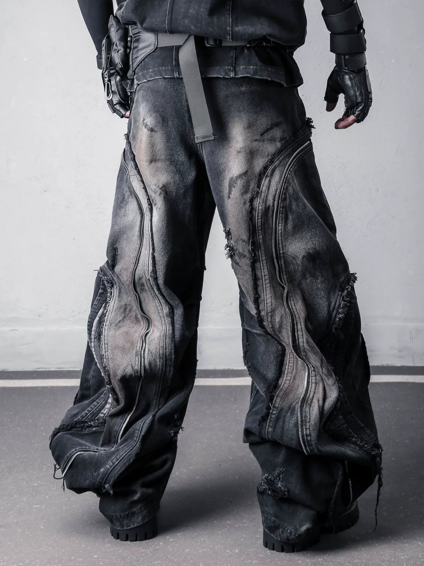Sanhoostudio denim pants featuring fringe details, deconstructed design, and wide leg silhouette for standout streetwear outfits.