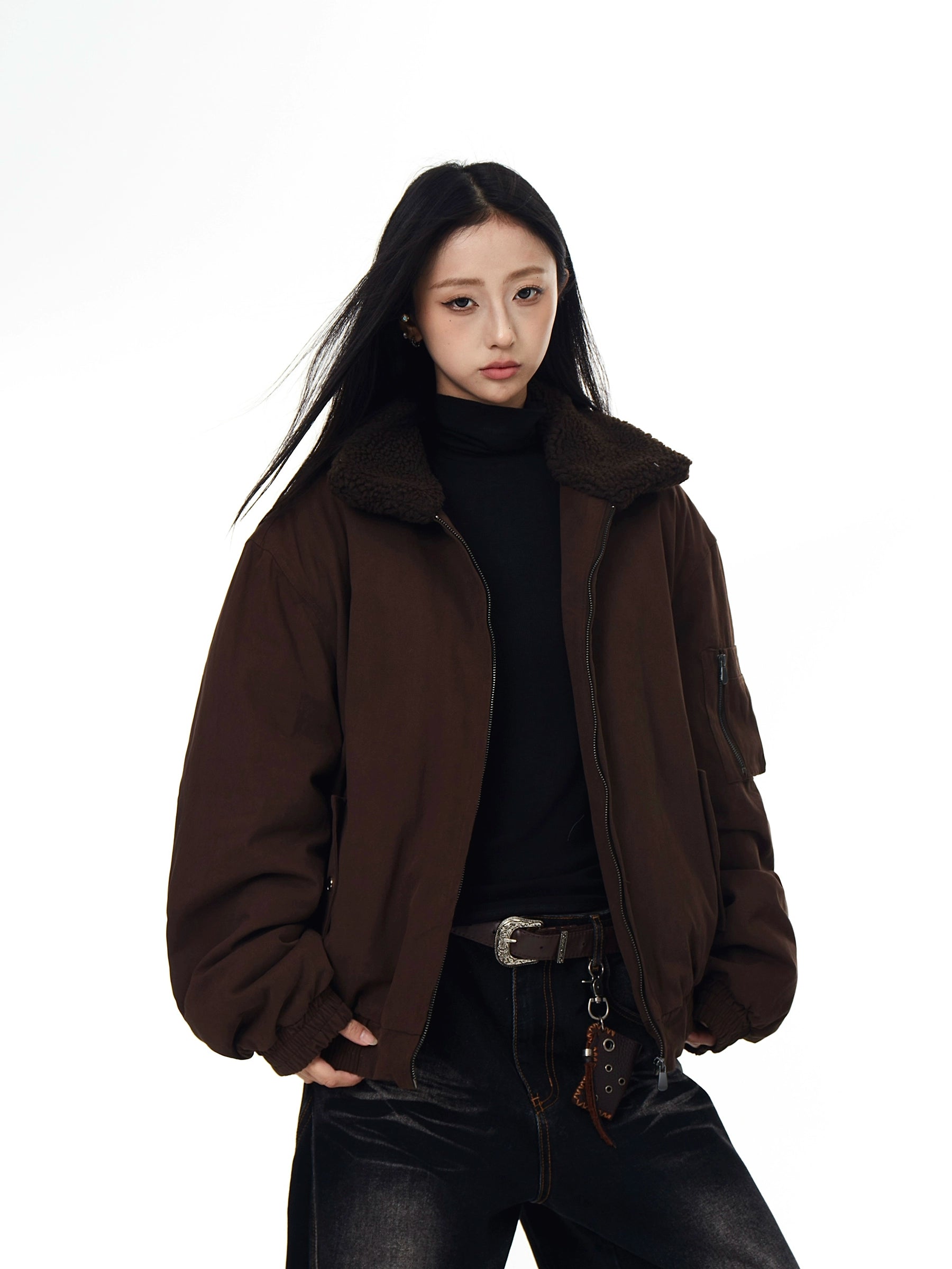 A cleanfit-style winter jacket with soft sherpa collar, coffee tone, and insulated warmth. Unisex minimalist design that pairs effortlessly with winter street looks. Sanhoostudio exclusive.