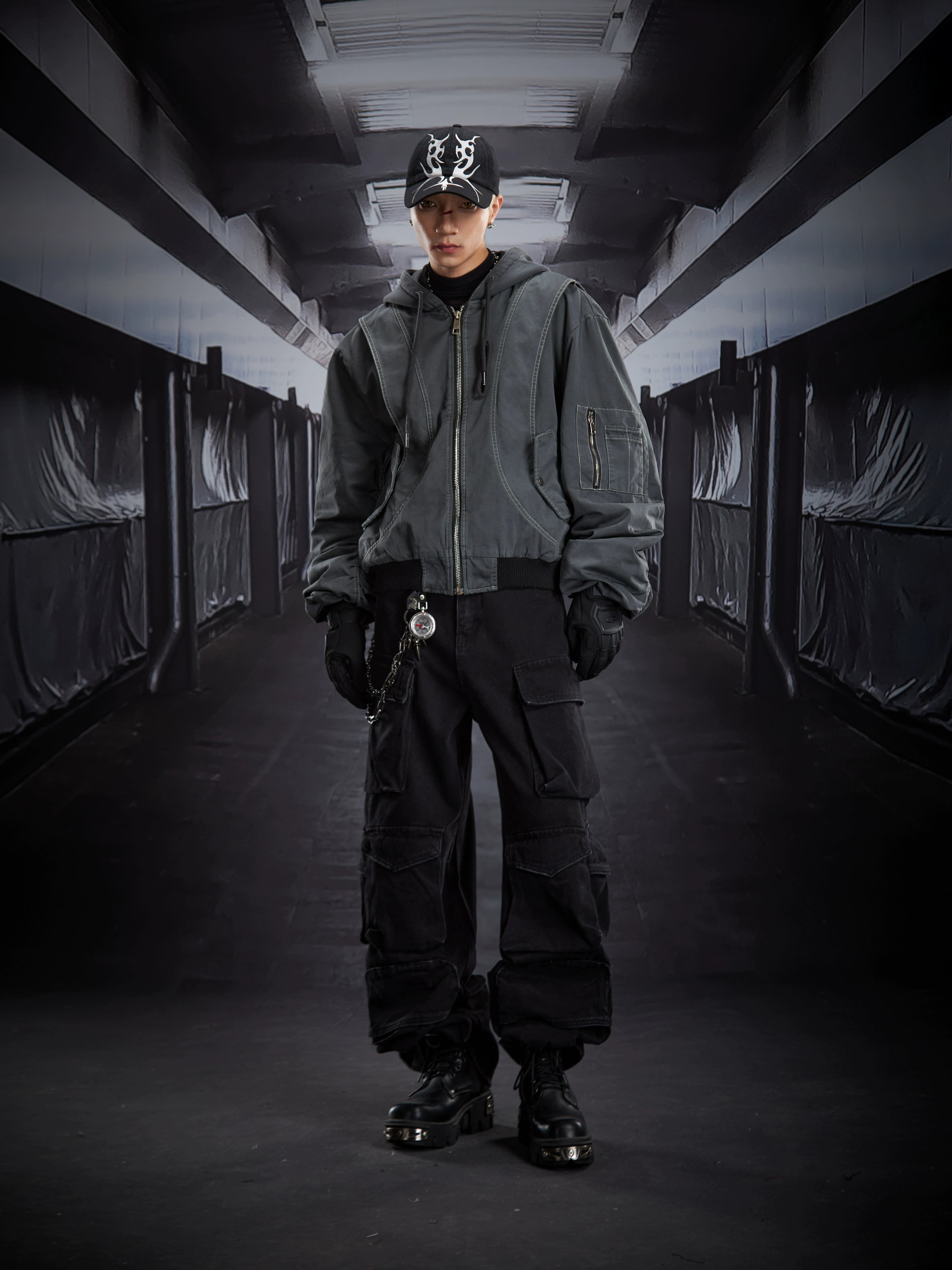 A versatile deconstructed utility puffer jacket with a hooded zip design, warm padding, and a relaxed cropped fit. Crafted by Sanhoostudio for a bold streetwear winter look.
