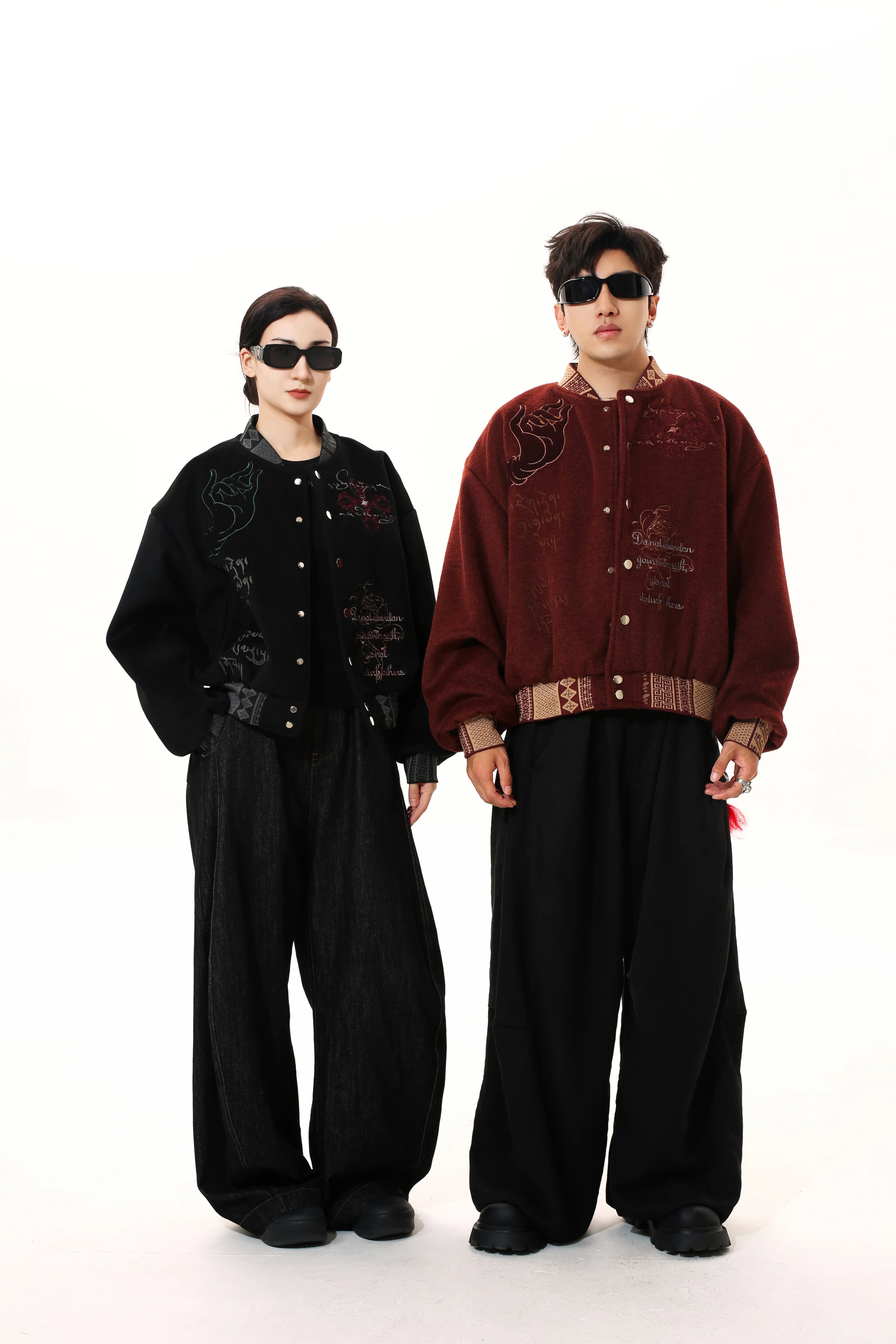 Sanhoostudio heavyweight varsity jacket with embroidered details. Designed for unisex fall streetwear and layering.