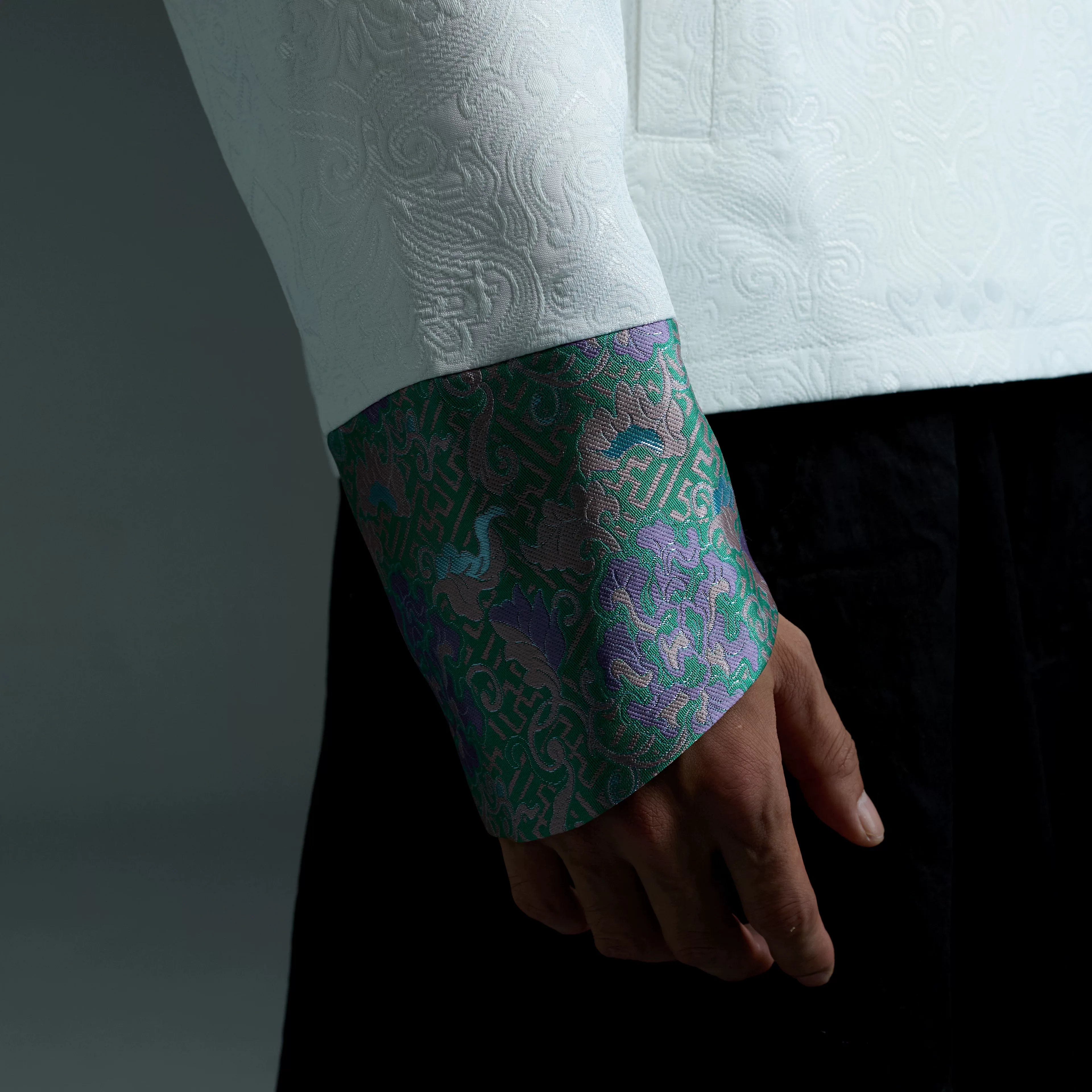 Sanhoostudio embroidered jacket with Tibetan snow lion graphics. A relaxed unisex streetwear piece designed for casual daily wear.