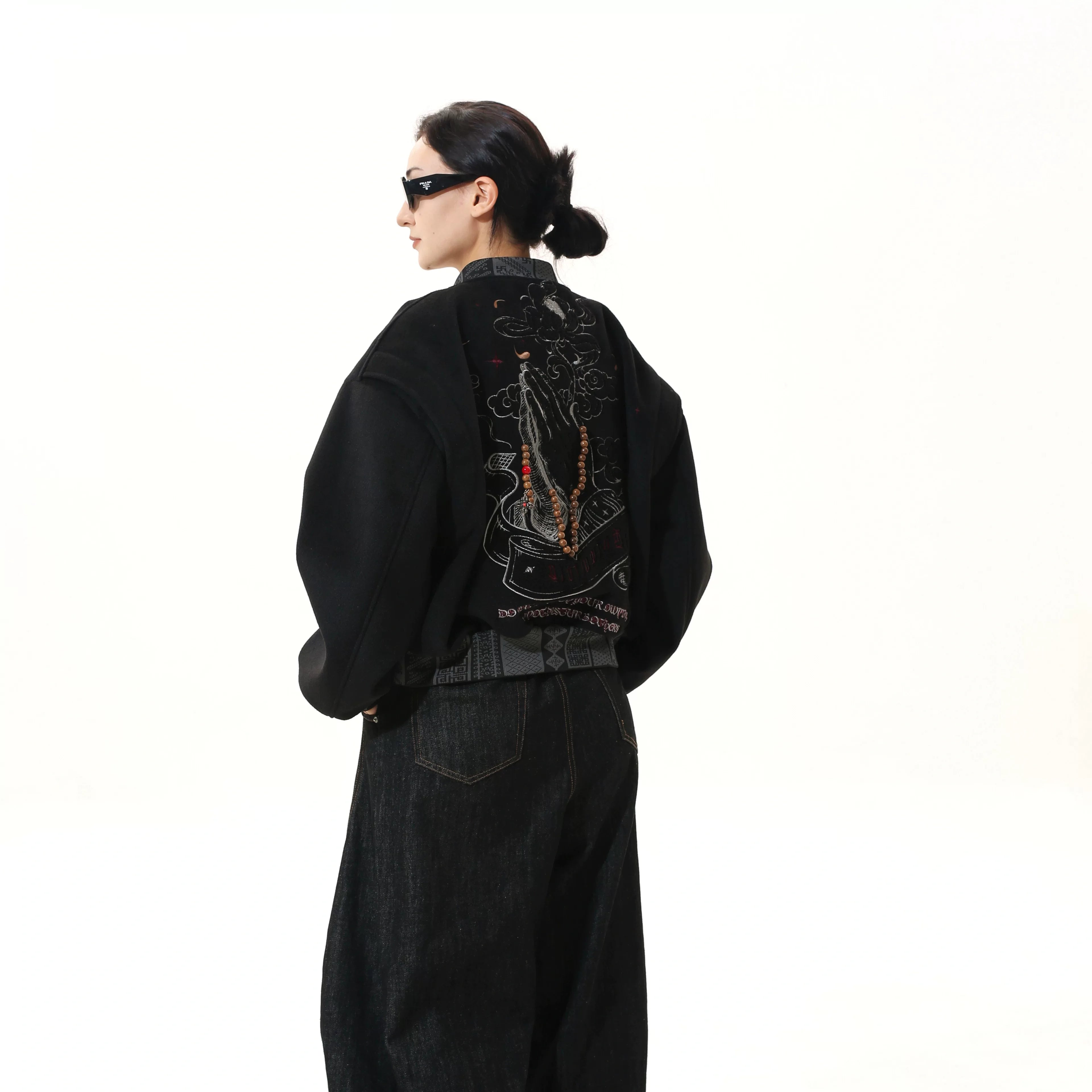 Sanhoostudio heavyweight varsity jacket with embroidered details. Designed for unisex fall streetwear and layering.