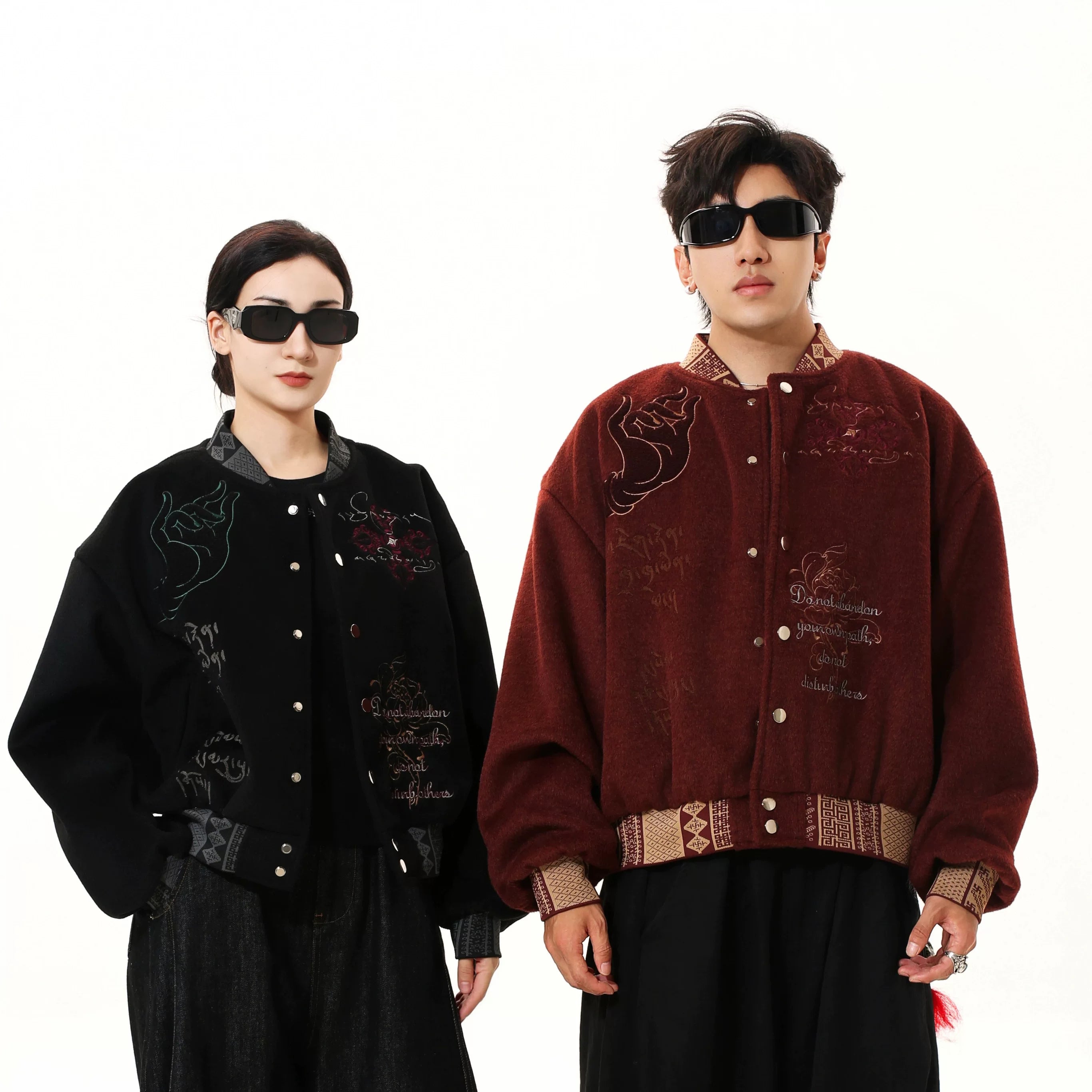 Sanhoostudio heavyweight varsity jacket with embroidered details. Designed for unisex fall streetwear and layering.